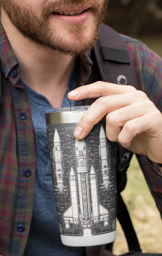 A bearded man being outdoors enjoying his Dark Rocket Tumbler